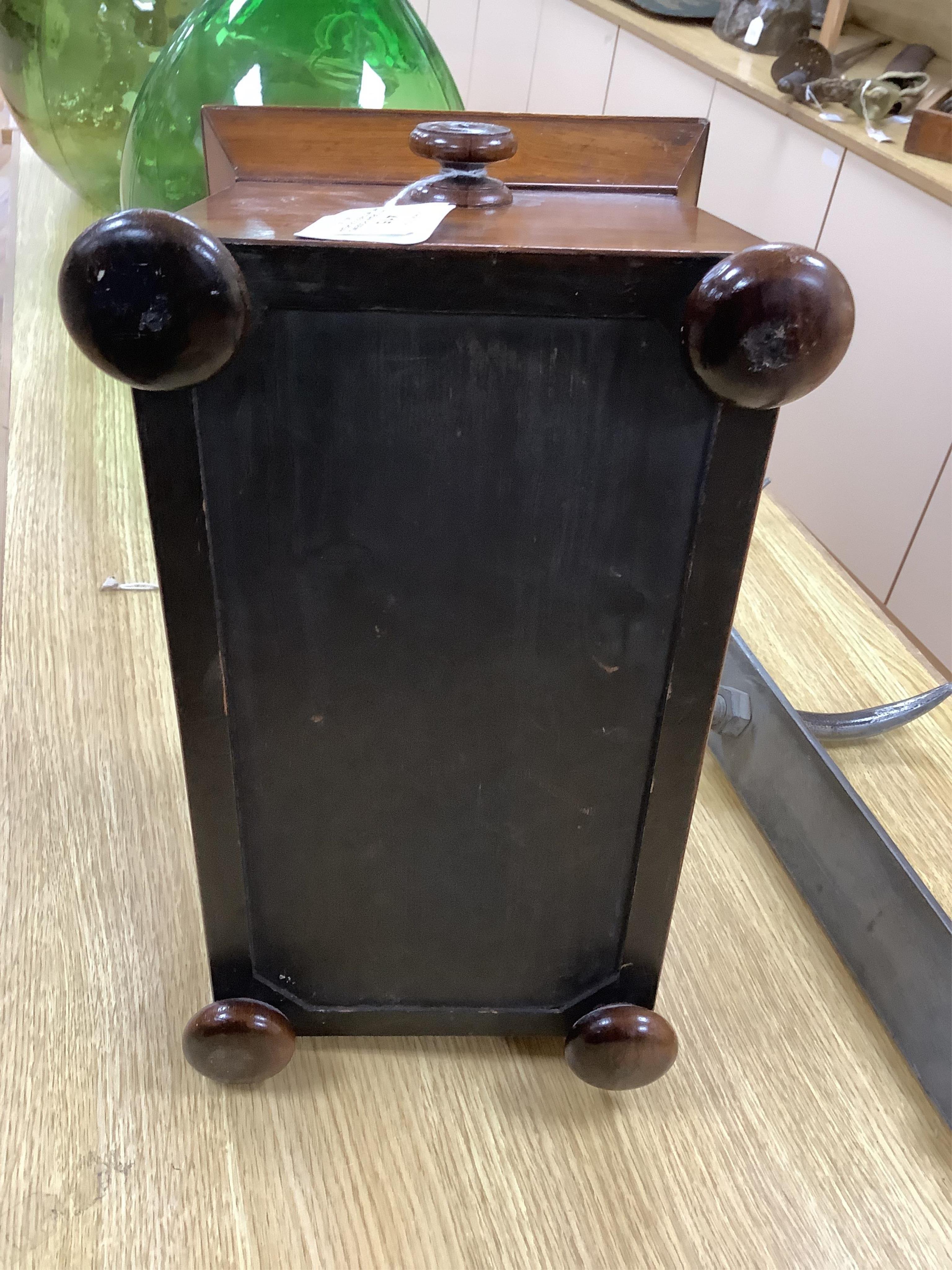 A Victorian rosewood and mother-of-pearl inlaid sarcophagus tea caddy, 39cm wide. Condition - fair